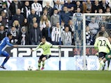 Wigan Athletic's Jean Beausejour scores against Newcastle United on March 17, 2013