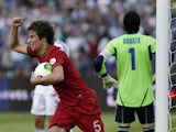 Portugal's Fabio Coentrao celebrates scoring against Israel during the World Cup qualifying match on March 22, 2013