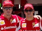 Ferrari drivers Fernando Alonso and Felipe Massa pose for a photo during the paddock of the Interlagos race track on November 22, 2012