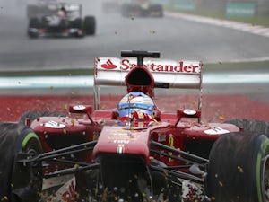 Ferrari take blame for Alonso retirement