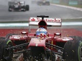 Ferrari driver Fernando Alonso crashes and ends up on the gravel during the Malaysian Grand Prix on March 24, 2013
