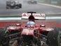 Ferrari driver Fernando Alonso crashes and ends up on the gravel during the Malaysian Grand Prix on March 24, 2013