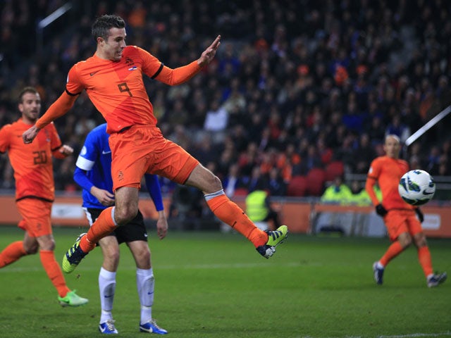 Robin van Persie scores for the Netherlands during their World Cup qualifier with Estonia on March 22, 2013