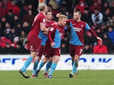 Scunthorpe's Mark Duffy celebrates with team mates after scoring against Doncaster on March 23, 2013