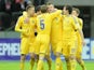 Ukraine players celebrate following a goal in their match against Poland on March 22, 2013