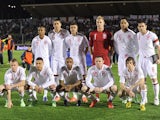 England players line up before their match with San Marino on March 22, 2013