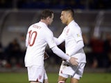 England's Alex Oxlade-Chamberlain celebrates scoring against San Marino on March 22, 2013