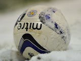 A football in the snow taken January 18, 2013