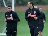 England players Steven Gerrard and Rio Ferdinand during a training session on October 8, 2010