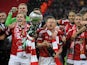 Wrexham players celebrates after beating Grimsby in the FA Carlsberg Trophy Final on March 24, 2013