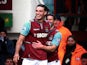 Andy Carroll is congratulated by team mate Matt Jarvis after scoring his second against West Brom on March 30, 2013