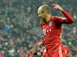 Munich's Arjen Robben celebrates after scoring his team's fourth against Hamburger SV on March 30, 2013