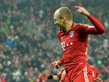 Munich's Arjen Robben celebrates after scoring his team's fourth against Hamburger SV on March 30, 2013