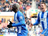 Arouna Kone is joined by James McCarthy after scoring the winning goal against Norwich on March 30, 2013