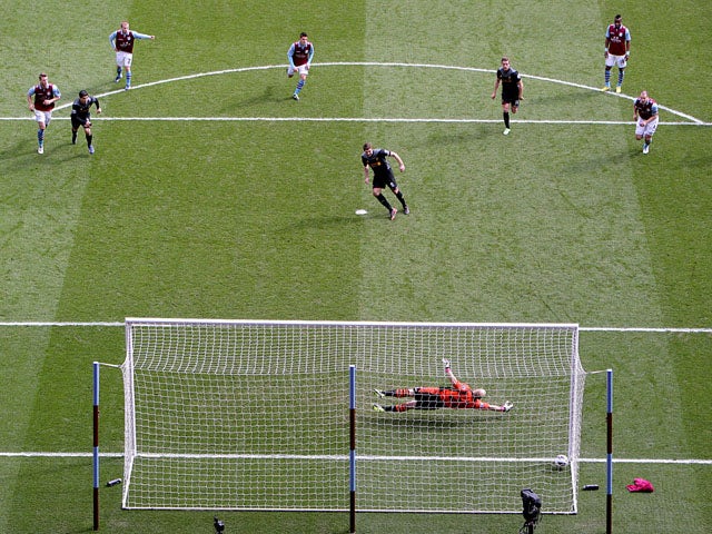 Liverpool captain Steven Gerrard scores from the penalty spot during his side's match with Aston Villa on March 31, 2013