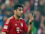 Munich's Claudio Pizarro gestures during the match against Hamburger on March 30, 2013