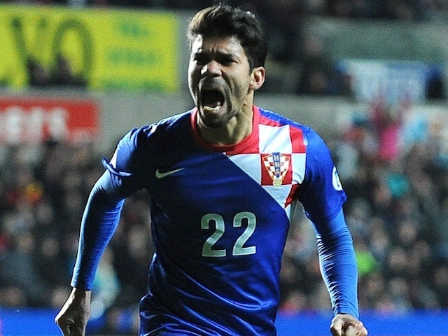 Croatia's Eduardo celebrates scoring against Wales on March 26, 2013