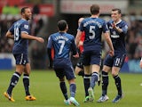 Jan Vertonghen is congratulated by team mates after scoring the opening goal against Swansea on March 30, 2013