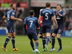 Spurs survive late Swansea scare