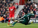Jay Rodriguez slots the ball past Petr Cech to score the opening goal against Chelsea on March 30, 2013