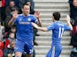 John Terry is congratulated by team mate Oscar after scoring the equaliser against Southampton on March 30, 2013