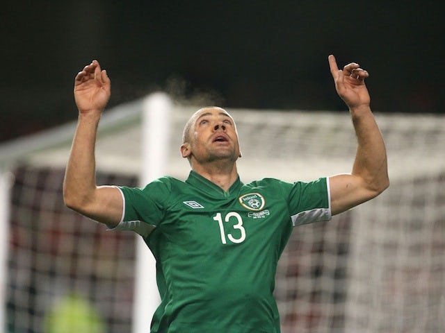 Ireland's Jonathan Walters celebrates after scoring a penalty against Austria on March 26, 2013