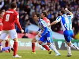 Brighton's Leonardo Ulloa celebrates after scoring the opening goal against Nottingham Forest on March 30, 2013