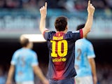 Barcelona's Lionel Messi celebrates after scoring his team's second against Celta Vigo on March 30, 2013
