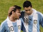 Argentina teammates Lionel Messi and Javier Pastore leave the pitch after beating Costa Rica on July 11, 2011
