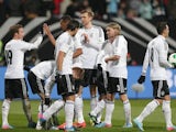Germany's Mario Goetze celebrates with teammates after a goal against Kazakhstan on March 26, 2013