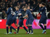 Paris Saint Germain players celebrates after grabbing a late goal against Montpellier on March 29, 2013
