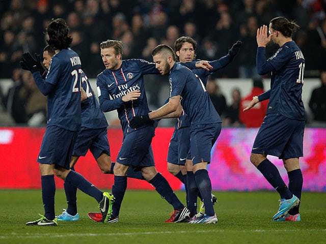 Paris Saint Germain players celebrates after grabbing a late goal against Montpellier on March 29, 2013