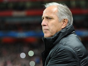 Montpellier manager Rene Girard watches his side's Champions League match against Arsenal on November 21, 2012