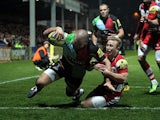 Harlequins' Rob Buchanan scores his team's first try against Gloucester on March 29, 2013