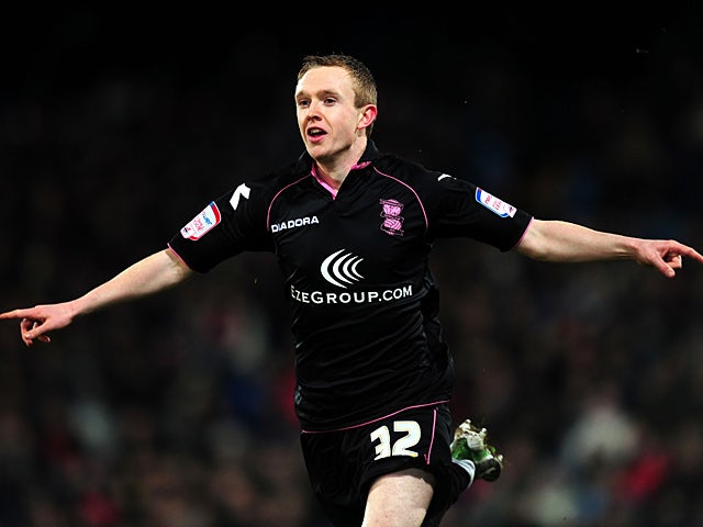 Birmingham's Shane Ferguson celebrates moments after scoring his team's fourth against Crystal Palace on March 29, 2013