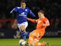 Leicester's Anthony Knockaert and Millwall's Shane Lowry battle for the ball on March 29, 2013