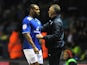 Leicester's Wes Morgan is consoled by manager Nigel Pearson after being sent off against Millwall on March 29, 2013