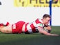 Wigan's Dom Crosby scores a try during the Super League match against St Helens on March 29, 2013