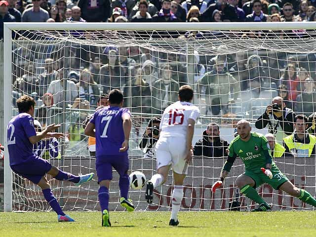 Fiorentina's Adem Ljajic scores a penalty against AC Milan in April 7, 2013