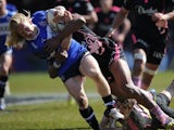 A Stade Francais player tackles Bath's Tom Biggs during the Challenge Cup match on April 6, 2013