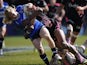 A Stade Francais player tackles Bath's Tom Biggs during the Challenge Cup match on April 6, 2013