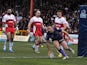 Wigan Warriors' Blake Green scores a touchdown against Hull KR on April 1, 2013