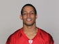 New Dolphins signing Brent Grimes in his Falcons photocall on July 19, 2012
