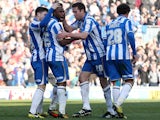 Brighton's Kazenga LuaLua celebrates scoring a late equaliser in his side's match against Leicester on April 6, 2013