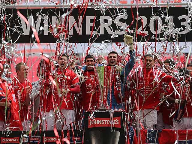 Crewe Alexandra celebrate winning the the Johnstone's Paint Trophy after beating Southend in the final on April 7, 2013