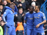 Chelsea players congratulate Demba Ba after his goal against Man Utd on April 1, 2013