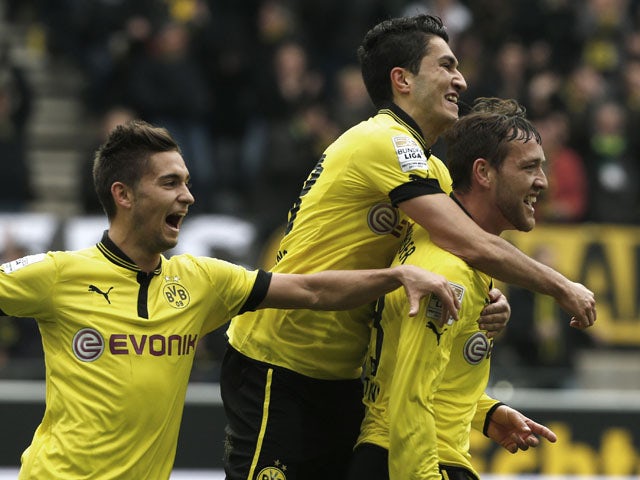 Dortmund's Julian Schieber celebrates scoring against Augsburg on April 6, 2013
