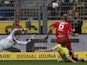 Augsburg's Kevin Vogt scores against Borussia Dortmund on April 6, 2013