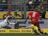 Augsburg's Kevin Vogt scores against Borussia Dortmund on April 6, 2013