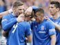 Ranger's Fraser Aird is congratulated by team mates after scoring his team's second goal against Queen's Park on April 7, 2013